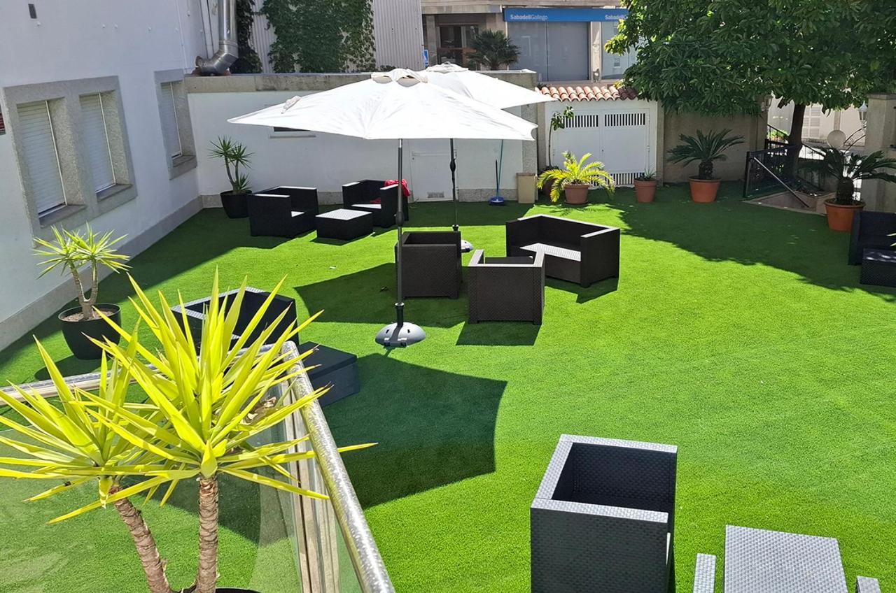 Hotel Cervantes Sanxenxo Bagian luar foto